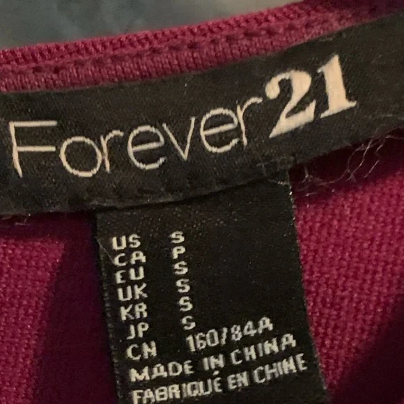Forever 21 plum colored stretch knit bodycon dress. - Picture 3 of 4